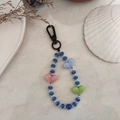 Close-up of handmade beaded keychain with blue striped beads and heart charms - Blue Striped Multicolor Heart Beaded Style (YS-A230012H)