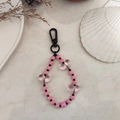 Detail of beaded keychain featuring pink striped beads and translucent acrylic hearts - Sweet Pink and White Beaded Style (YS-A230012K)