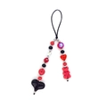 Detail of beaded phone strap featuring a black heart and red gummy bear charm pendant - Red-Black Faceted Beads With Black Heart And Red Bear (SZ-A240086C)