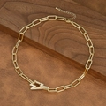 Detail of gold paperclip link necklace with a lightning bolt pendant set with cubic zirconia - Lightning Pendant Style (NE2599-E)
