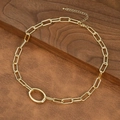 Detailed close-up of a gold paperclip chain necklace with a large oval connector link - Large Oval Ring Clasp Style (NE2599-G)