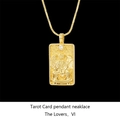Detailed close-up of The Lovers tarot card pendant with crystal inlay on a golden chain - LOVERS / Gold