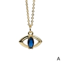 Macro detail of gold plated Evil Eye pendant featuring a blue marquise cut zircon stone - Deep Blue Marquise Cut Style (NE1454-A)