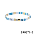 Detail view of Bohemian elastic bracelet with matte white, blue ink, and gold square beads - White Matte Blue Ink Style (BR0877-B)