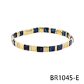 Detailed macro view of Bohemian Tila bracelet with blue purple tiles and golden metal spacers - Blue Purple Black Gold Patterned Style (BR1045-E)