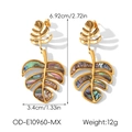Detailed view of hollow monstera leaf earrings with colorful abalone shell inlays - Multicolor (OD-E10960-MX)