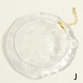 Detail of chunky white matte link chain with gold lobster clasp and extension chain - White