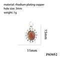 Detailansicht eines ovalen Kupferanhängers mit orangem Edelstein und Zirkonbesatz - Orange-Roter Ovaler Silberstil (P03052)