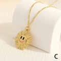 Detail of 18K gold-plated sunflower smiley pendant with micro-set zircon on Figaro chain - Pink Smiley Style (NE2094-C)