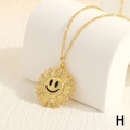 Close-up of golden sunflower smiley face pendant with micro-inlaid rhinestones on a figaro chain - Black Smiley Style (NE2094-H)