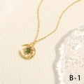Detalle de colgante de sol y luna dorada con opale verde y piedras de circón - Oro con piedra principal verde (NE2146-B-1)