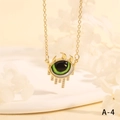 Macro shot of evil eye necklace with green iris and white zircon droplets in gold finish - Green Black Realistic Eyeball Tassel Style (NE2265-A-4)
