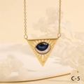 Detail of golden triangle evil eye pendant necklace resting on white floral petals - Blue Black Realistic Triangle Style (NE2265-C-5)