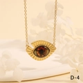 Close-up of gold Turkish evil eye necklace with red center and sunburst metal rays - Red Black Realistic Eyeball Style (NE2265-D-4)