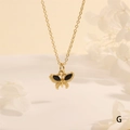 Detail of 18K gold butterfly pendant with black inlay on a delicate chain necklace - Black Zirconia (NE2275-G)