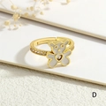 Macro shot of gold-plated open ring with white enamel bear and heart-shaped zircon detail - Adjustable Open / White Bear Style (RG0745-D)