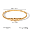 Detailed view of gold stainless steel bangle with five graduated crystal settings - Gradient Beaded Style (OD-B20307)