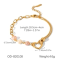 Detail of golden stainless steel bracelet with heart charm and three elegant pearls - Hollow Heart Pearl Style (OD-B20086)