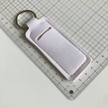 Detailed macro view showing the precise dimensions of white fabric keychain pouch - Pure White