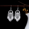 Bohemian ethnic style long silver-plated tassel earrings featuring delicate leaf charms - Silver Round Hollow Leaf Tassel Style (E2538-01)