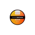 Crème bronzante OUHOE Shine Brown Original pour un teint doré dans un pot orange rond - Crème de Bronzage / 50 g