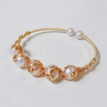 Detail of handmade gold wire-wrapped bracelet with seven white freshwater pearls - Gold Five Large Pearls Vintage Wrapped Style