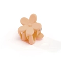 Detail shot of apricot flower hair clip with matte texture and metal spring mechanism - Pale Green