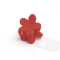 Detail shot of mini bright orange flower hair claw clip with matte frosted finish - Red