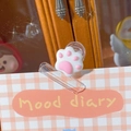Cute pink and white cat paw decorative paper clip on a transparent plastic binder - White Cat Paw