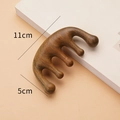 Green sandalwood 5-tooth scalp massage comb with dolphin shape measuring 11cm by 5cm - Green Sandalwood Five Tooth Ball