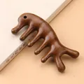 Deep brown sandalwood dolphin hair scalp massager with five-point ergonomic meridian design - Dolphin Shape With Hole