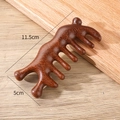 Deep brown sandalwood 5-tooth massage comb with dolphin shape measuring 11.5cm by 5cm - Golden Sandalwood Ten Tooth Snail