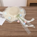 Straw sun hat with organza brim, lace ribbons and floral accents in beige and blue - Four Flower String Beige