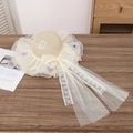 Beige woven straw sun hat featuring elegant white lace ribbons and blue flower details - Purple Flower Butterfly Beige