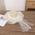 Chic cream straw sun hat featuring wide lace brim and long bow ribbon for beach vacation - Thin Lace Beige