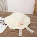 Beige woven straw sun hat with white lace trim, pink flowers, and long lace ribbons - Two Pink And Milky White Flowers