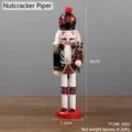 Figurine casse-noisette de 30cm avec uniforme noir et doré et thème flûte - Casse-Noisette Flûtiste