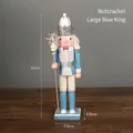 31cm Nutcracker Soldier in Blue King outfit with snowflake scepter and silver glitter - Large Blue Nutcracker King