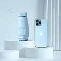 Ultra-light light blue six-fold capsule umbrella showing compact size next to smartphone - Flat 6-Fold Ordinary Black Glue / With Cloth Sleeve / Sky Blue