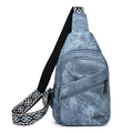 Denim blue soft PU leather sling bag with trendy geometric woven wide shoulder strap - Blue