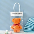 Orange coral fleece bear towel in a transparent gift bag with a red ribbon and handle - Bear Loves Horse Orange + Opp Handbag / 30*30cm