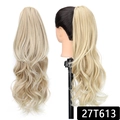 Detailed view of claw clip ponytail extension in wavy 27T613 ash blonde shade - 27t613