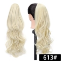 Detail view of 613# platinum blonde wavy ponytail hair extension with texture and length - 613