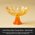 Glazed lotus-shaped glass tea cup in orange jelly finish with elegant high foot base - Jelly Orange