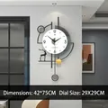 Orologio da parete moderno con silhouette di alce e pendolo in nero oro e grigio 42x75cm - Stile Medio