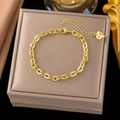 18k gold plated Cuban chain bracelet with heart pendant on a beige jewelry box - 39【e163】flat Cross Chain Bracelet Gold