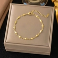 Elegant gold-tone stainless steel bracelet featuring multiple delicate star shaped charms - Pentagram Bracelet - Gold