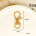 Detailed view of a golden lobster clasp with 34.5mm length and 16mm width specs. - Swivel Snap Hook (18) / KC Gold