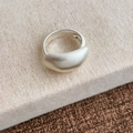 Macro detail of silver ring featuring brushed matte finish and smooth inner surface - Silver