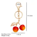 Portachiavi con ciliegia alla moda con charms sfumati rosso giallo e gancio dorato - Ciliegia Piccola - Sfumatura Rosso-Giallo